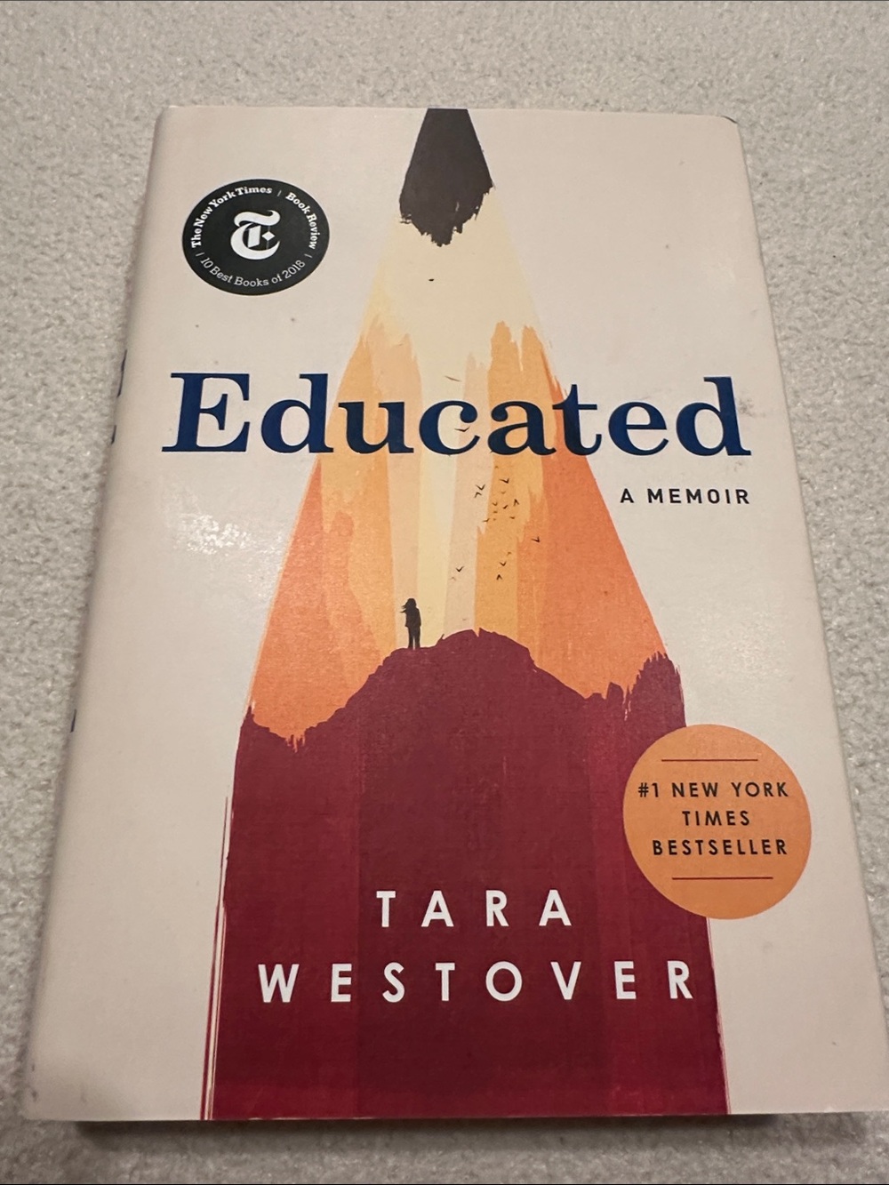 Educated by Tara Westover - White Cover with Orange, Red & Yellow Pencil Art
